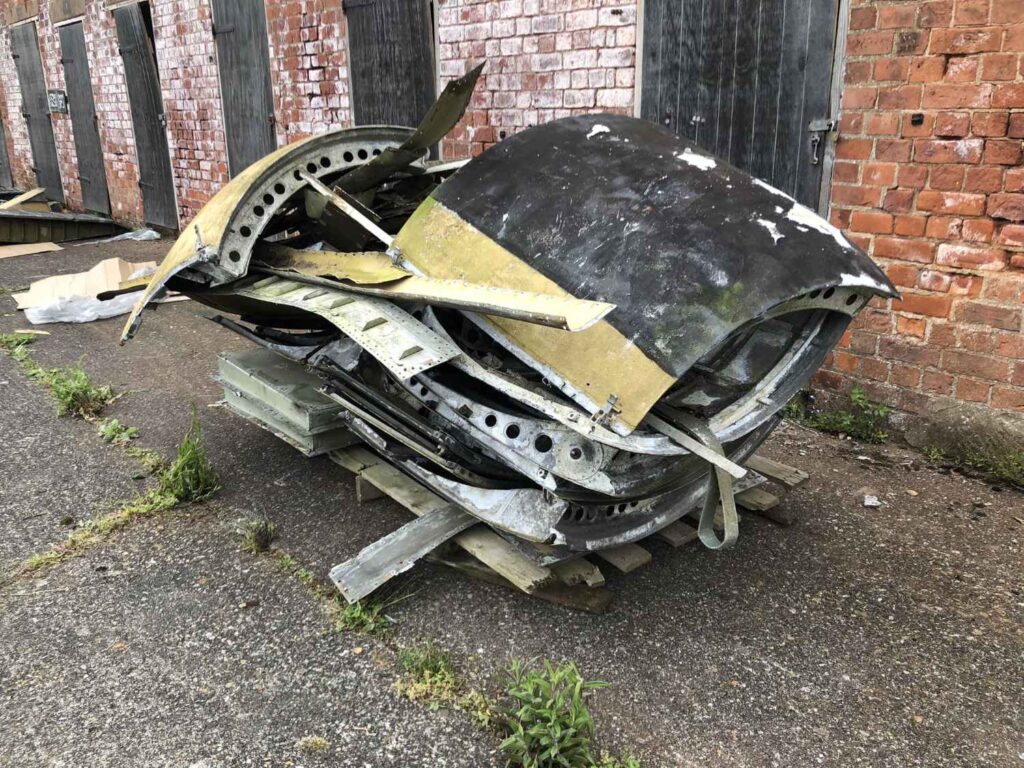 A pile of parts taken off Blackburn Beverley sitting on a wooden pallet.