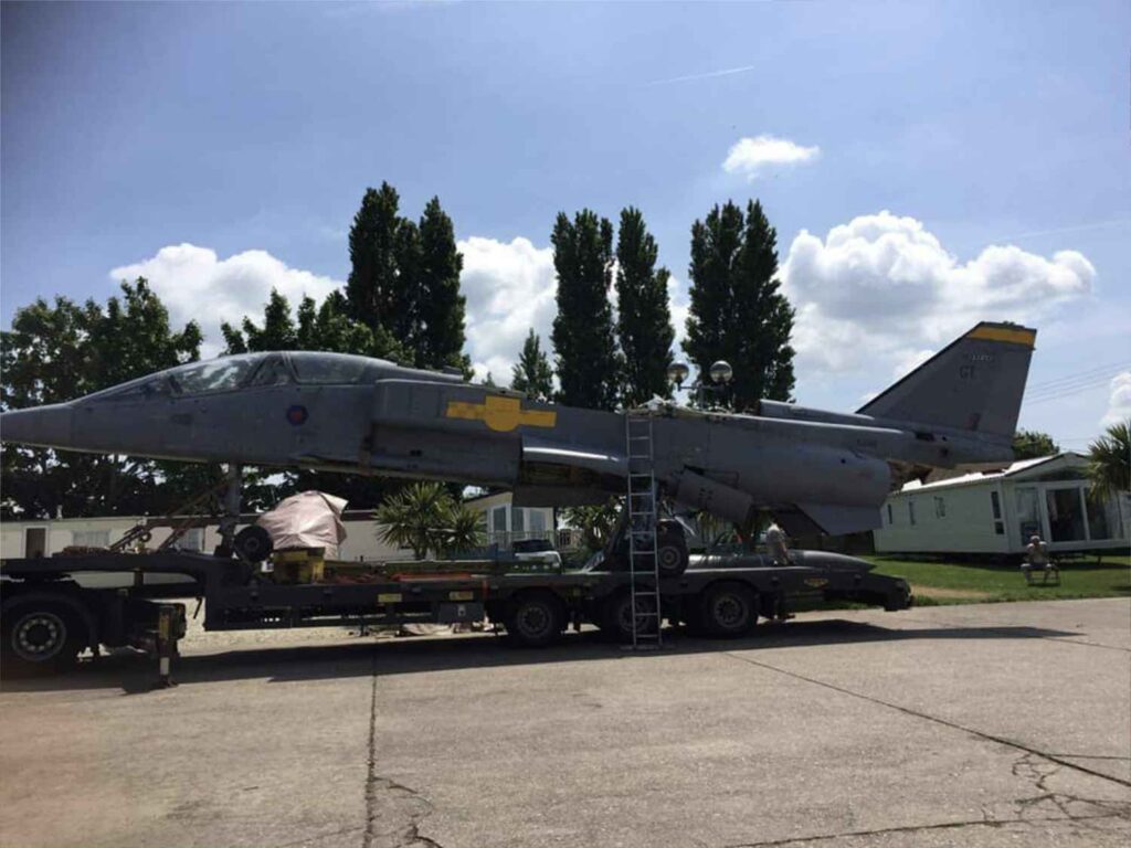 Left hand side view of the SEPECAT Jaguar XX146 fuselage sitting on the trailer.