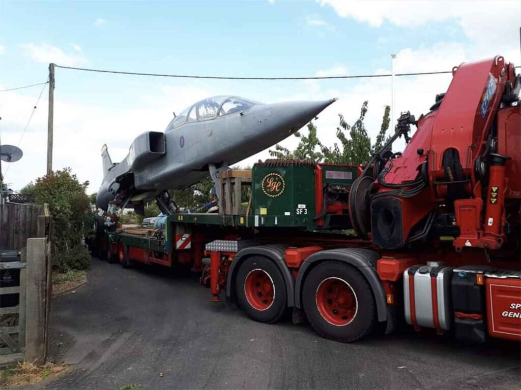 Front view of the truck and trailer setting off with the SEPECAT Jaguar XX146 fuselage.