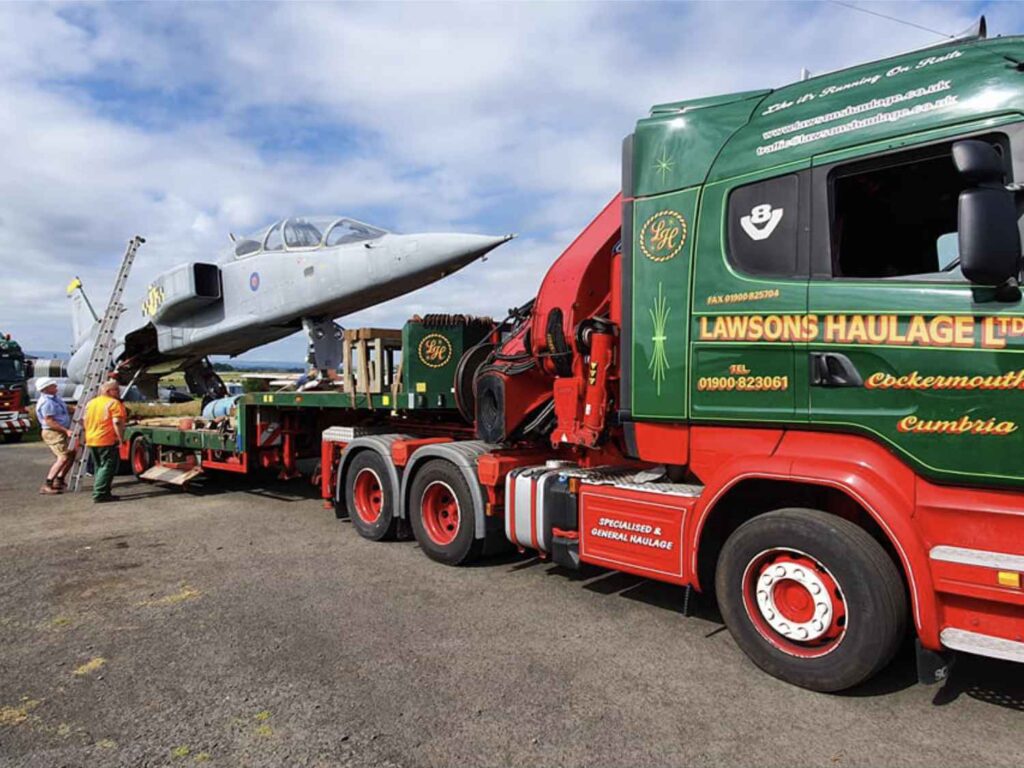 Front view of the truck and trailer arriving at the Solway Aviation Museum with the SEPECAT Jaguar XX146 fuselage.