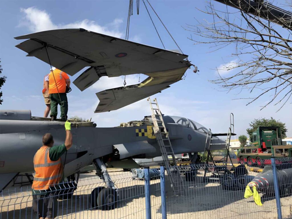 Using a crane to remove the wings from SEPECAT Jaguar XX146.