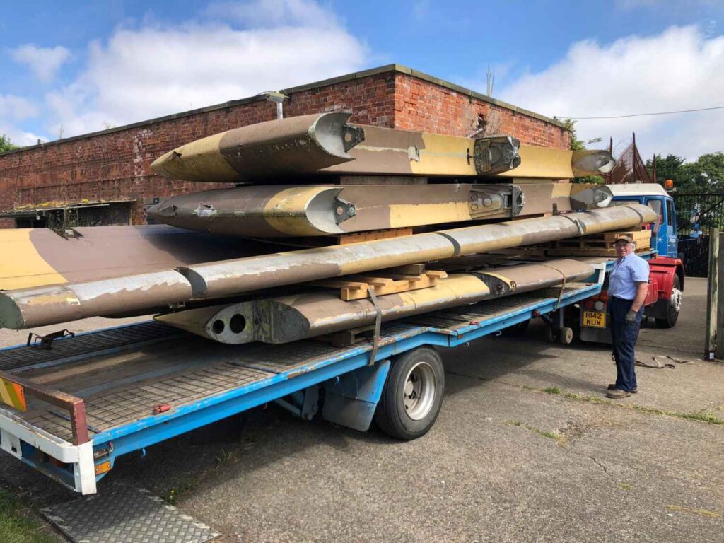 The dismantled wings of Blackburn Beverley sitting on a trailer.